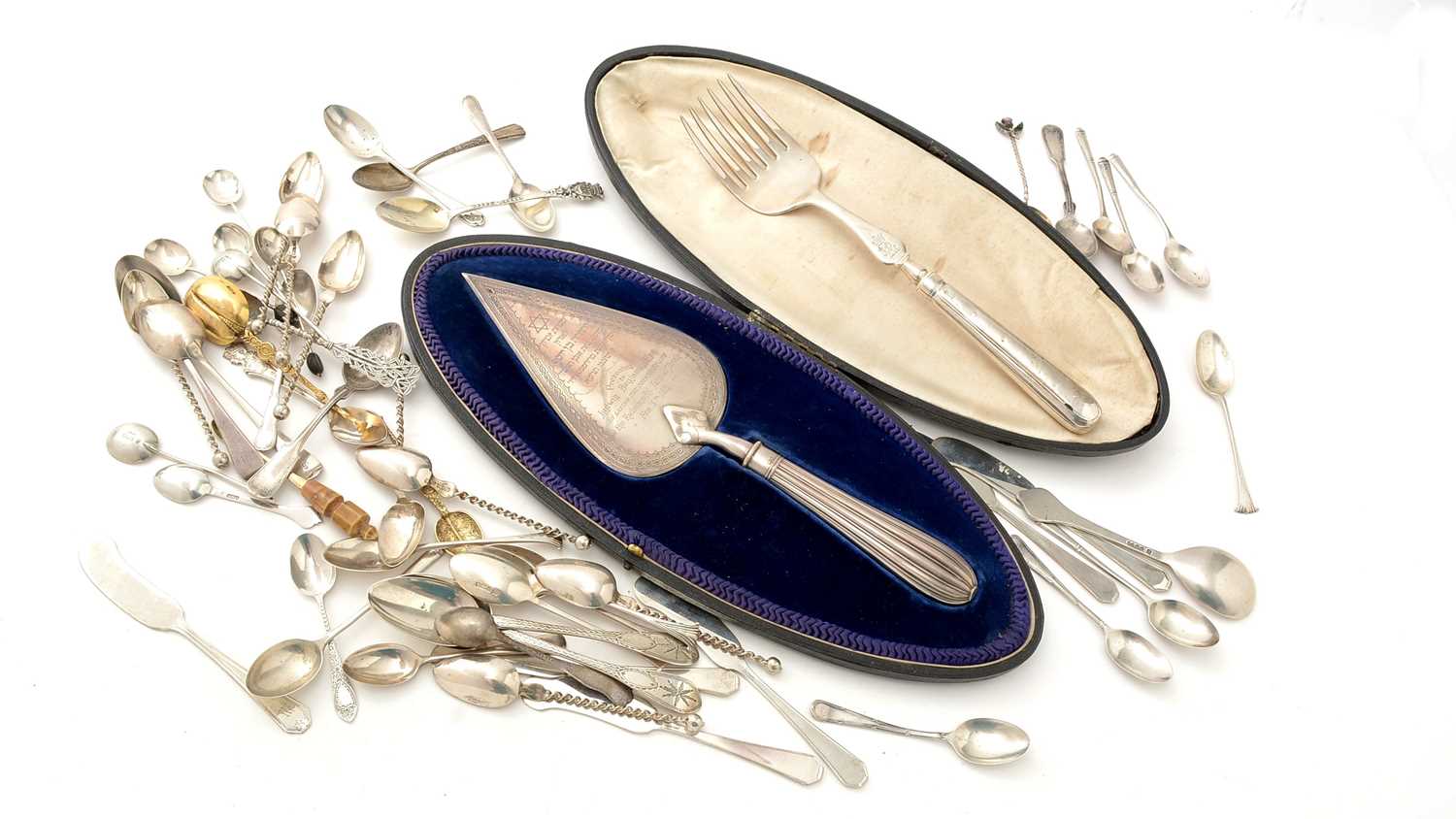 Lot 43 - An Edwardian silver trowel; small silver spoons; and a set of six American butter spreaders