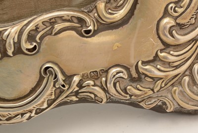 Lot 30 - Five various silver-mounted decorative photograph frames