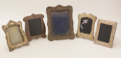 Lot 30 - Five various silver-mounted decorative photograph frames