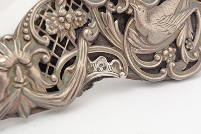 Lot 80 - A late Victorian silver mounted mirror frame