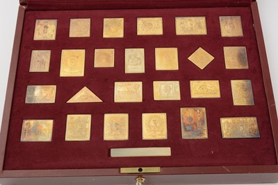 Lot 6 - An Elizabeth II limited edition set of 25 silver-gilt replica postage stamps; and another