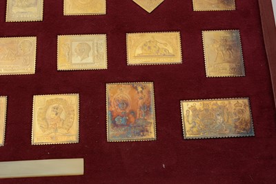 Lot 6 - An Elizabeth II limited edition set of 25 silver-gilt replica postage stamps; and another