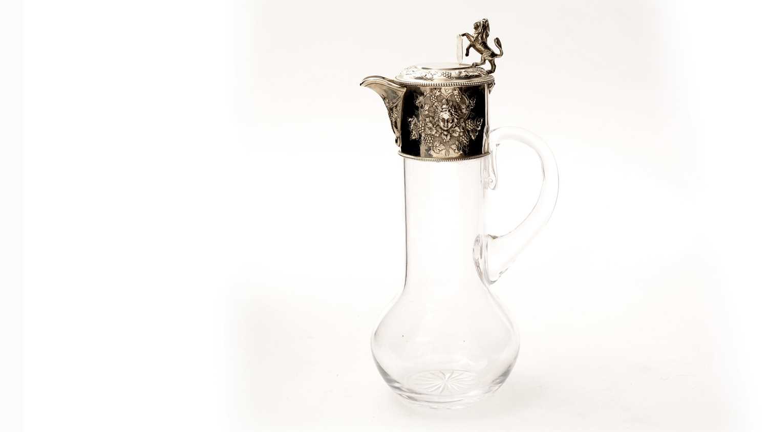 Lot 53 - A Victorian silver mounted clear glass claret jug