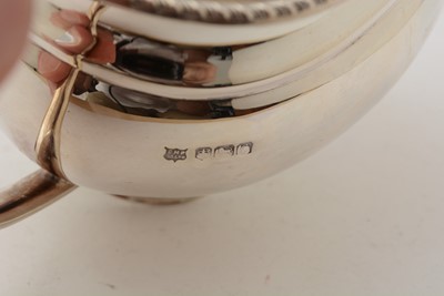 Lot 89 - A silver four-piece tea service