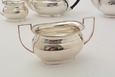 Lot 89 - A silver four-piece tea service