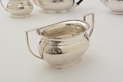 Lot 89 - A silver four-piece tea service