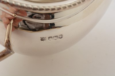 Lot 89 - A silver four-piece tea service