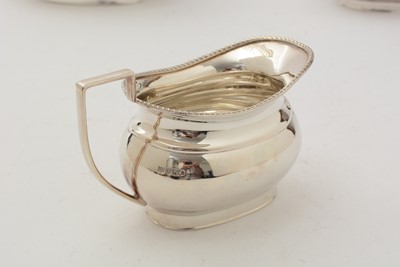 Lot 89 - A silver four-piece tea service