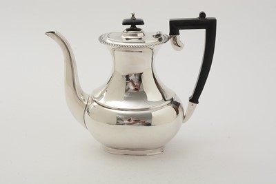 Lot 89 - A silver four-piece tea service