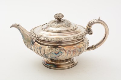 Lot 84 - A George III/IV Scottish silver three-piece tea service