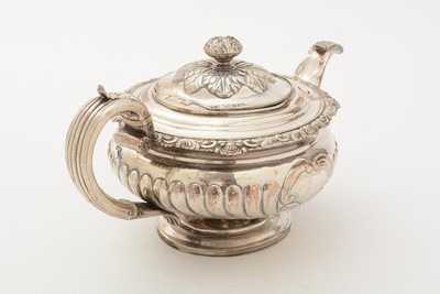 Lot 84 - A George III/IV Scottish silver three-piece tea service