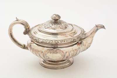 Lot 84 - A George III/IV Scottish silver three-piece tea service