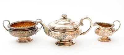 Lot 84 - A George III/IV Scottish silver three-piece tea service
