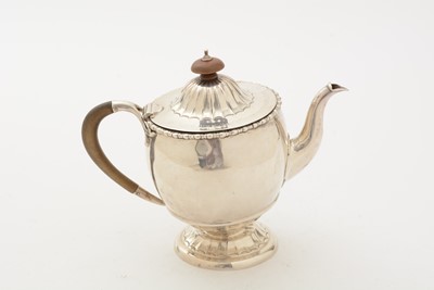 Lot 85 - ﻿A George V silver teapot and matching sugar bowl
