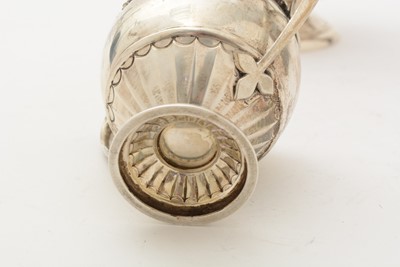 Lot 85 - ﻿A George V silver teapot and matching sugar bowl