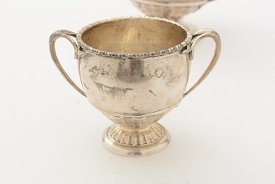 Lot 85 - ﻿A George V silver teapot and matching sugar bowl
