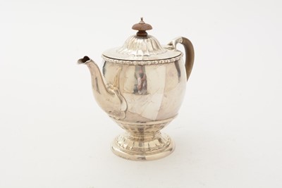 Lot 85 - ﻿A George V silver teapot and matching sugar bowl