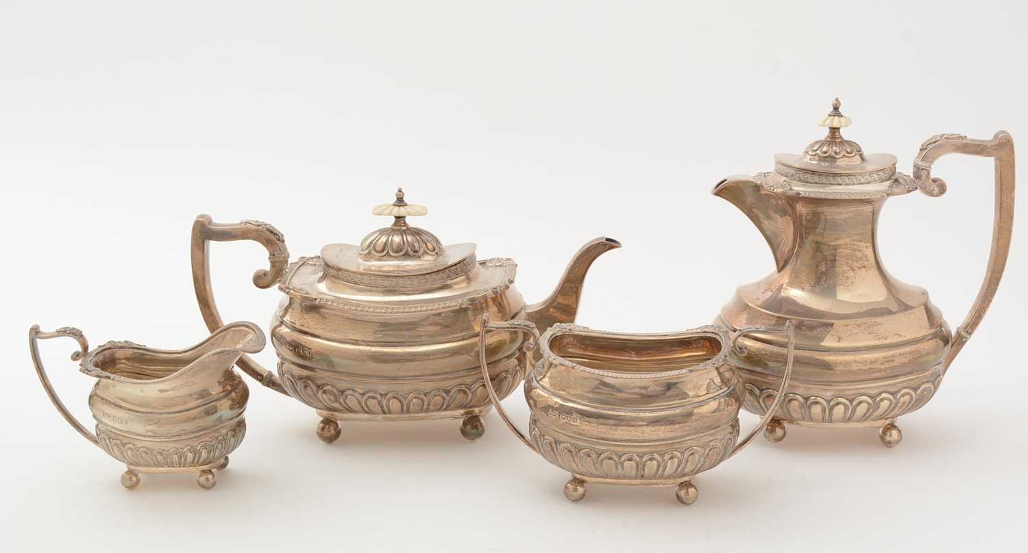 Lot 13 - A George V silver four piece tea set