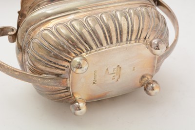 Lot 13 - A George V silver four piece tea set