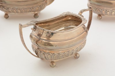 Lot 13 - A George V silver four piece tea set