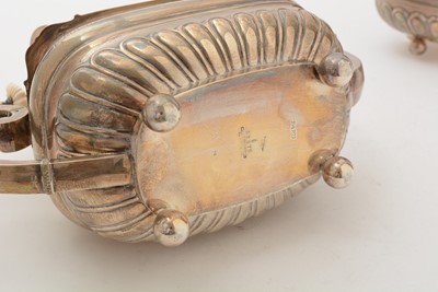 Lot 13 - A George V silver four piece tea set