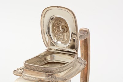 Lot 13 - A George V silver four piece tea set
