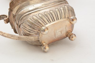 Lot 13 - A George V silver four piece tea set