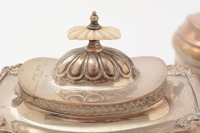 Lot 13 - A George V silver four piece tea set