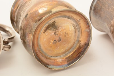 Lot 44 - Three small silver mugs