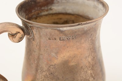Lot 44 - Three small silver mugs