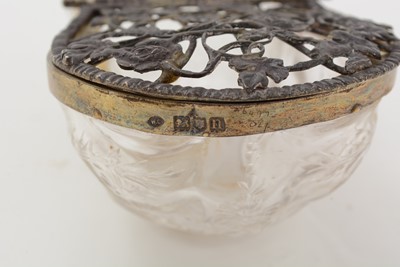 Lot 46 - An Edwardian silver gilt-mounted cut glass potpourri dish and other silver items