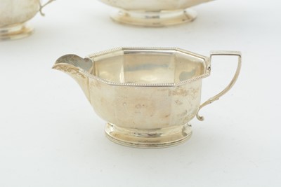 Lot 14 - An art deco silver three-piece tea set