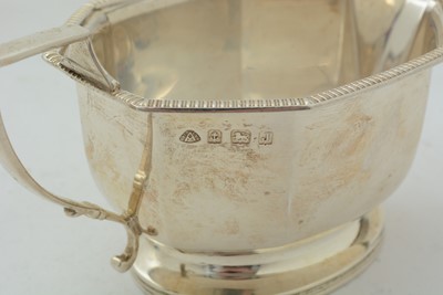 Lot 14 - An art deco silver three-piece tea set