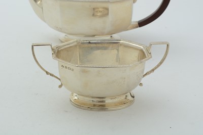 Lot 14 - An art deco silver three-piece tea set