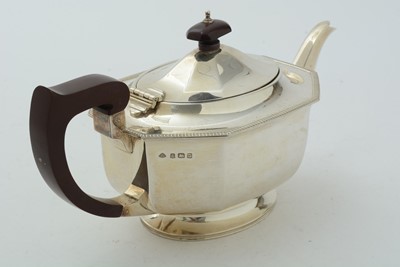 Lot 14 - An art deco silver three-piece tea set
