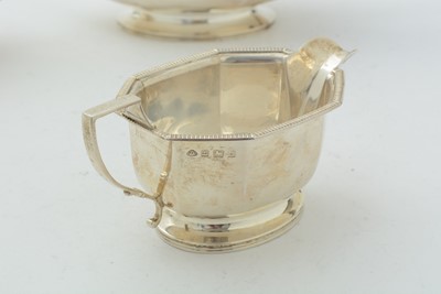 Lot 14 - An art deco silver three-piece tea set