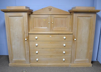 Lot 53 - A large stripped pine compactum/wardrobe