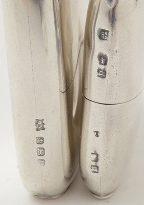 Lot 87 - A George V small silver spirit flask; and two others
