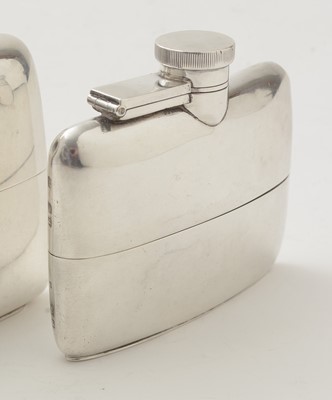 Lot 87 - A George V small silver spirit flask; and two others