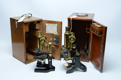 Lot 431 - A J Swift and Son of London ebonised microscope together with a E Leitz Wetzlar microscope