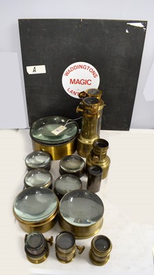 Lot 449 - A collection of seven Magic Lantern condenser lenses and more