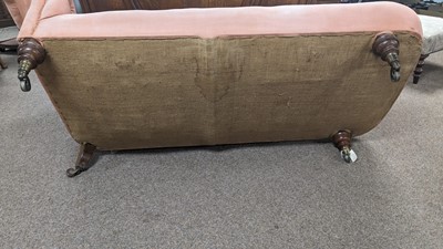 Lot 1 - Howard & Sons Ltd: A Victorian chaise longue upholstered in salmon pink fabric