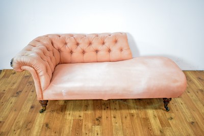 Lot 1 - Howard & Sons Ltd: A Victorian chaise longue upholstered in salmon pink fabric