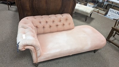Lot 1 - Howard & Sons Ltd: A Victorian chaise longue upholstered in salmon pink fabric