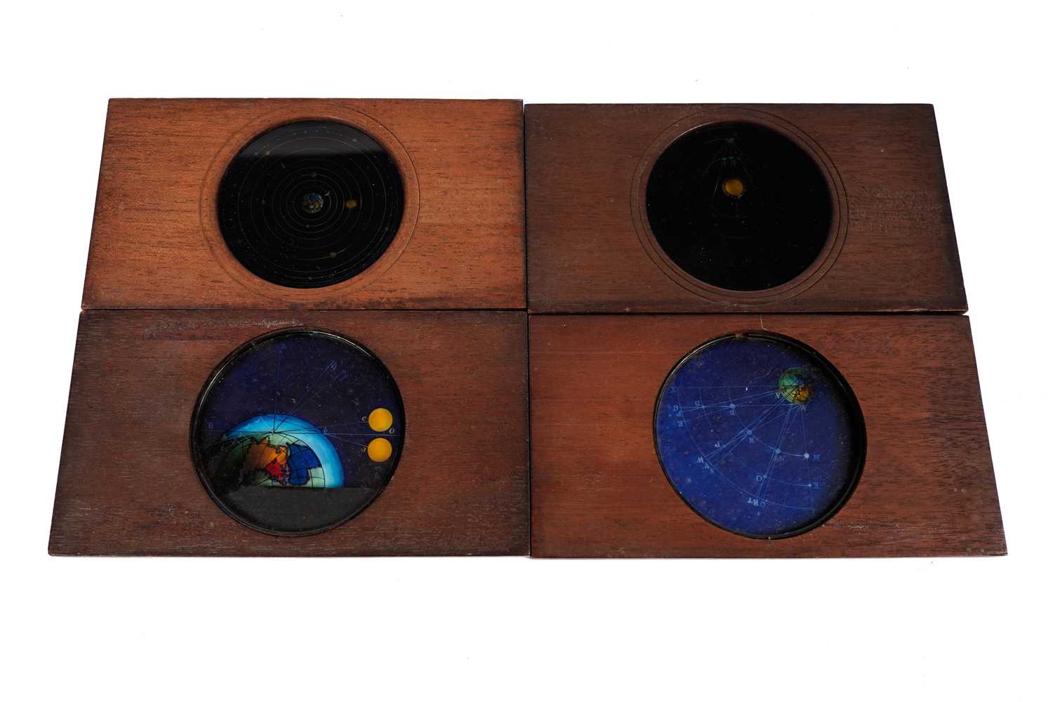 Lot 424 - A collection of four polychrome Carpenter and Westley magic lantern slides
