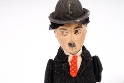 Lot 917 - Schuco: A 1920s Charlie Chaplin wind up tinplate clockwork toy