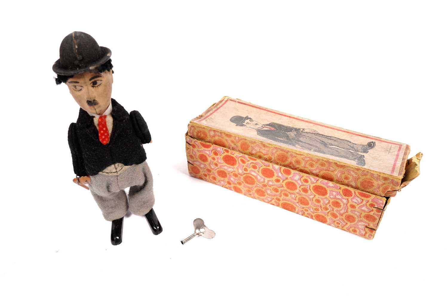 Lot 917 - Schuco: A 1920s Charlie Chaplin wind up tinplate clockwork toy