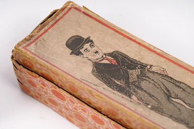 Lot 917 - Schuco: A 1920s Charlie Chaplin wind up tinplate clockwork toy