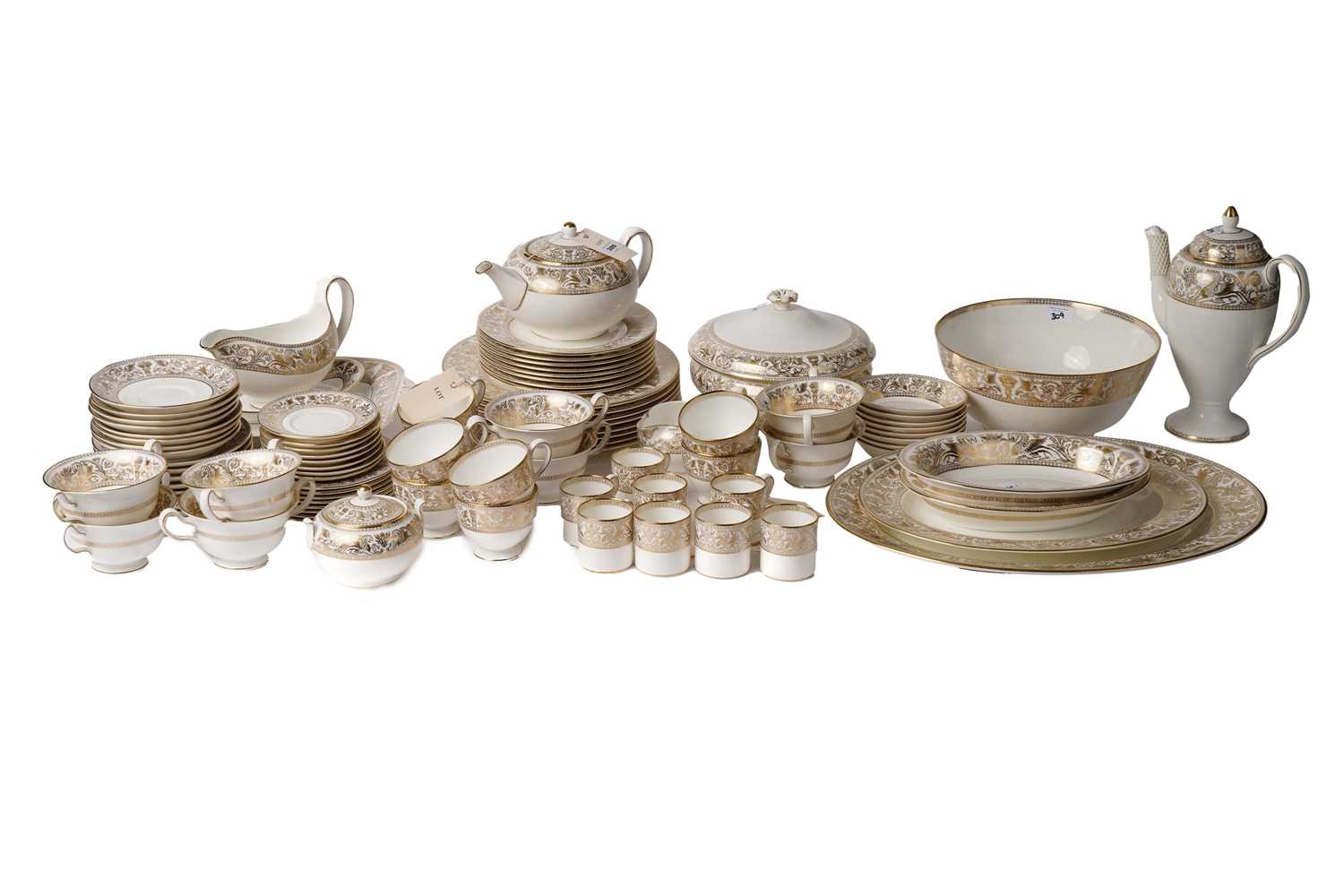 Lot 309 - A Wedgwood ‘Gold Florentine’ tea and dinner service
