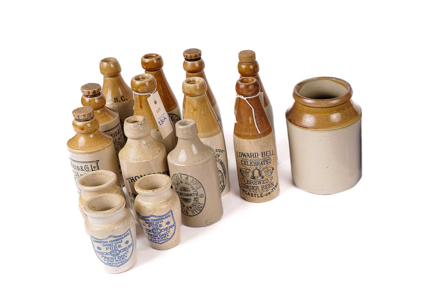 Lot 230 - A collection of 19th Century stoneware bottles and jars
